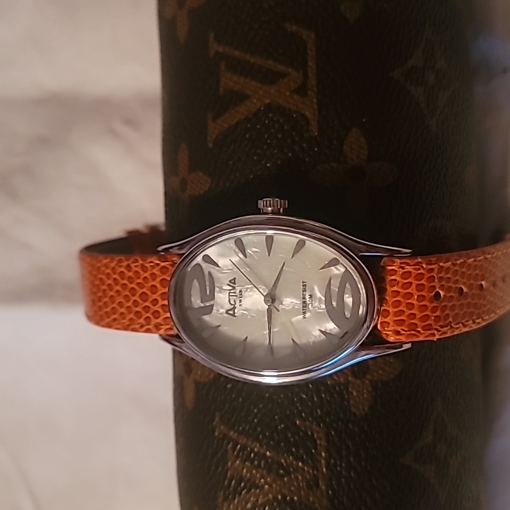 Activa By Invicta Swiss Watch Mother‎ of Pearl Orange Reptile Embossed Band